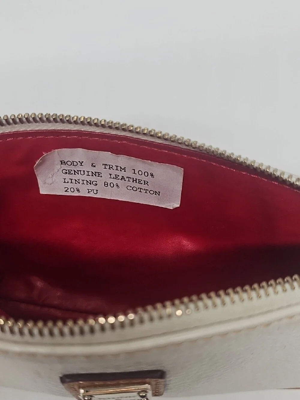 Dooney & Bourke Cream Leather Pouch